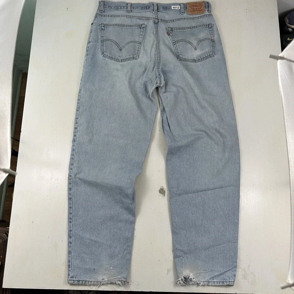 VTG‎ Levi's 560 Comfort Fit 38x34 Tapered Loose Jeans Light Wash Distressed Y2K